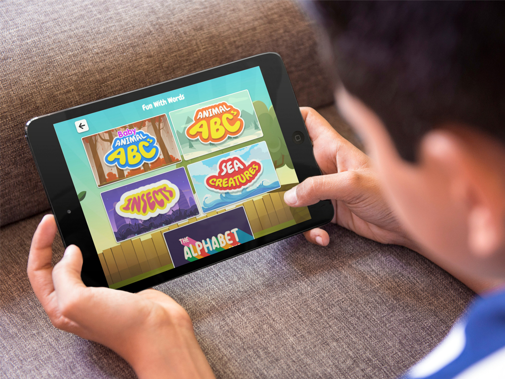 Child in Early Learning on tablet