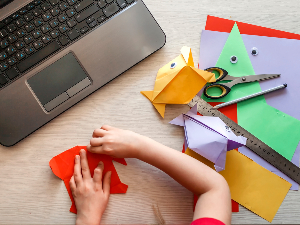 Child doing Origami