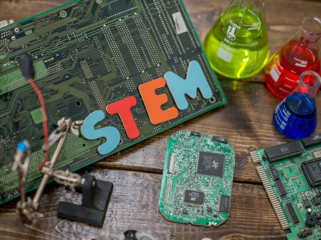 motherboard with STEM spelled with magnets