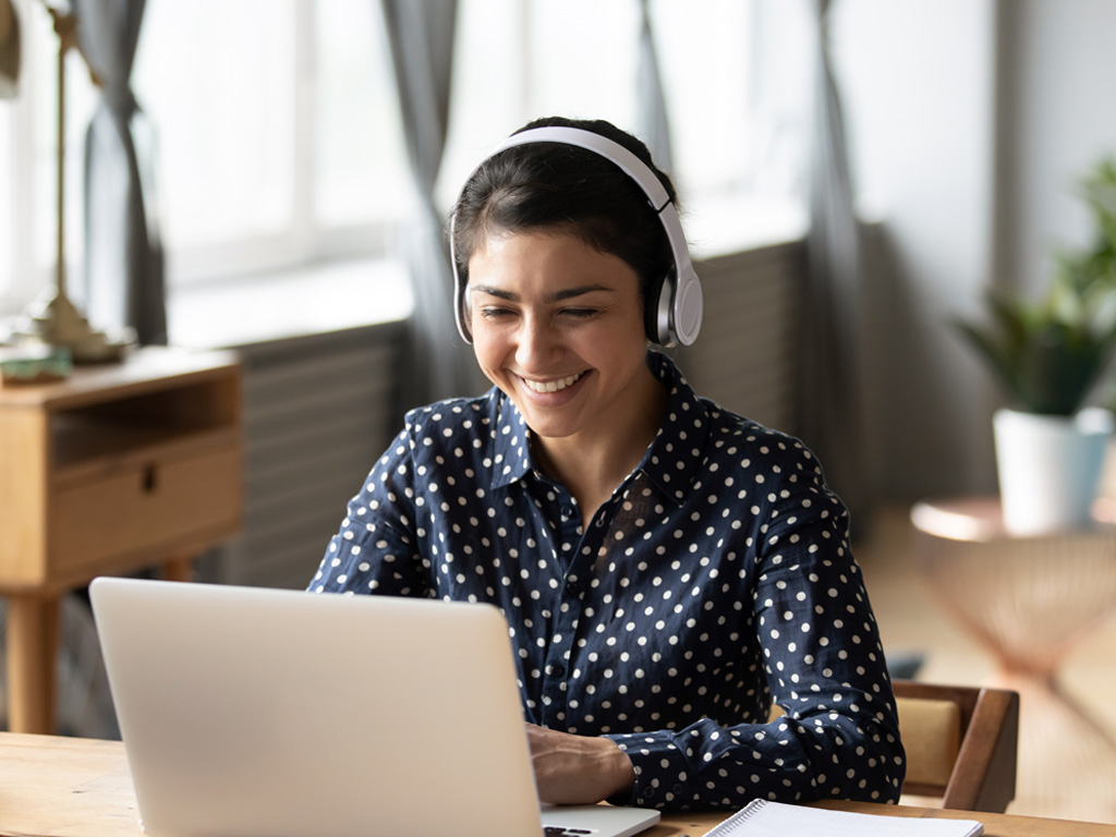 Adult woman working on a laptop
